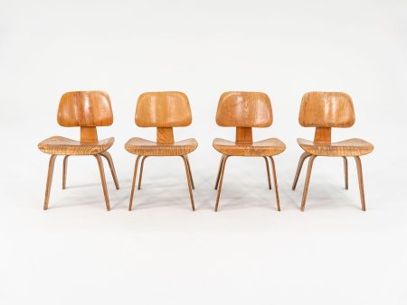 1948 Set of Four DCW Dining Chairs by Ray and Charles Eames for Herman Miller in Calico Ash Online Sale